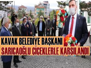 BAŞKAN SARICAOĞLU'NA ÇİÇEKLİ KARŞILAMA