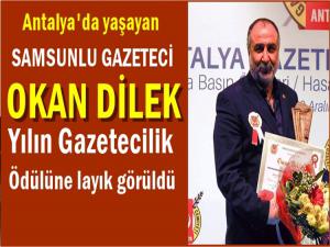 OKAN DİLEK'E YILIN GAZETECİLİK ÖDÜLÜ