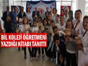 SAMSUN BİL KOLEJİ ÖĞRETMENİ YAZDIĞI KİTABI İMZALADI